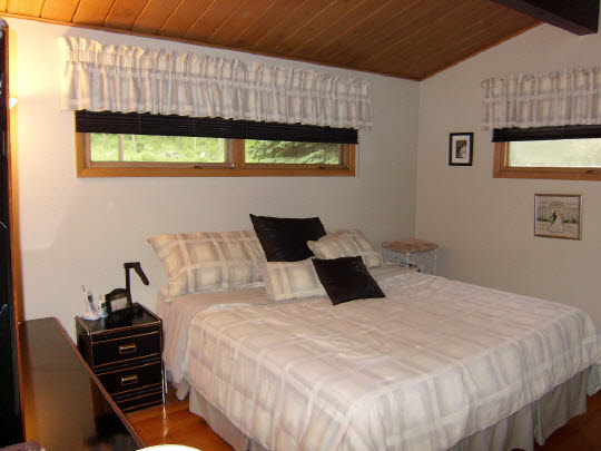 3117 Spring Creek Road Rockford, IL 61107 - Photo 6 of 11 a bedroom with a bed and a window