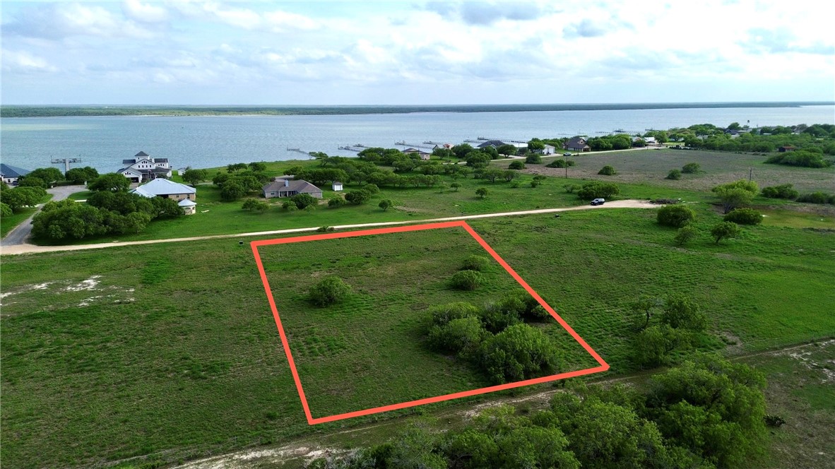 Lot 4 T-head Drive Riviera, TX 78379 - Photo 3 of 6 a view of a green field with an ocean