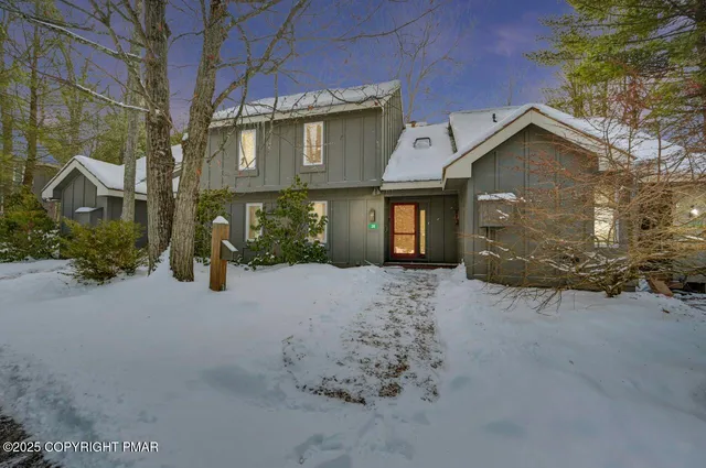 a view of a house with a street