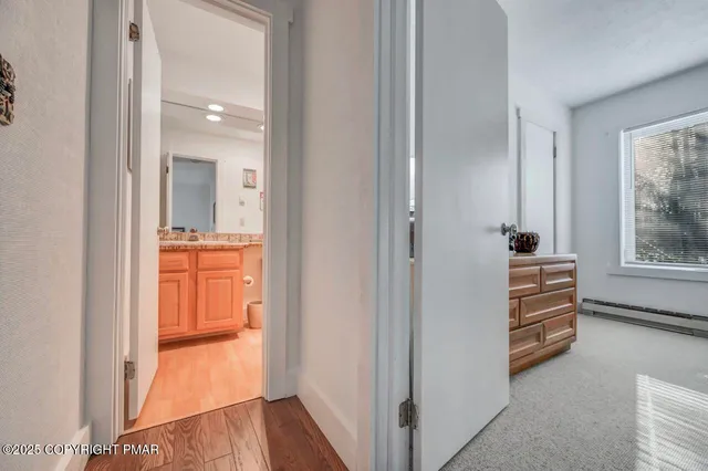 a view of an empty room and window