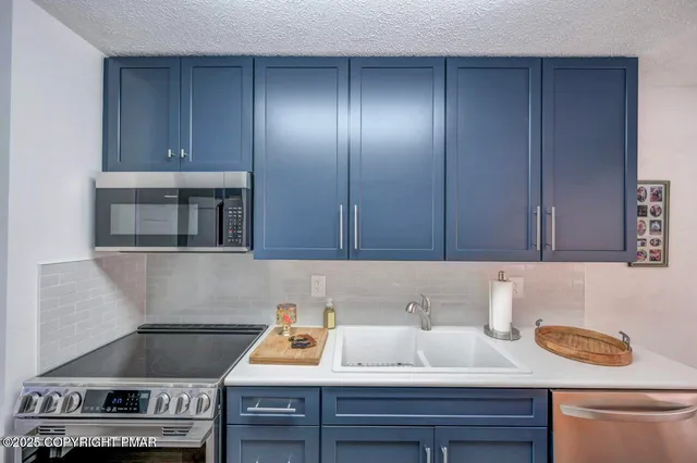 a bathroom with a sink and a stove