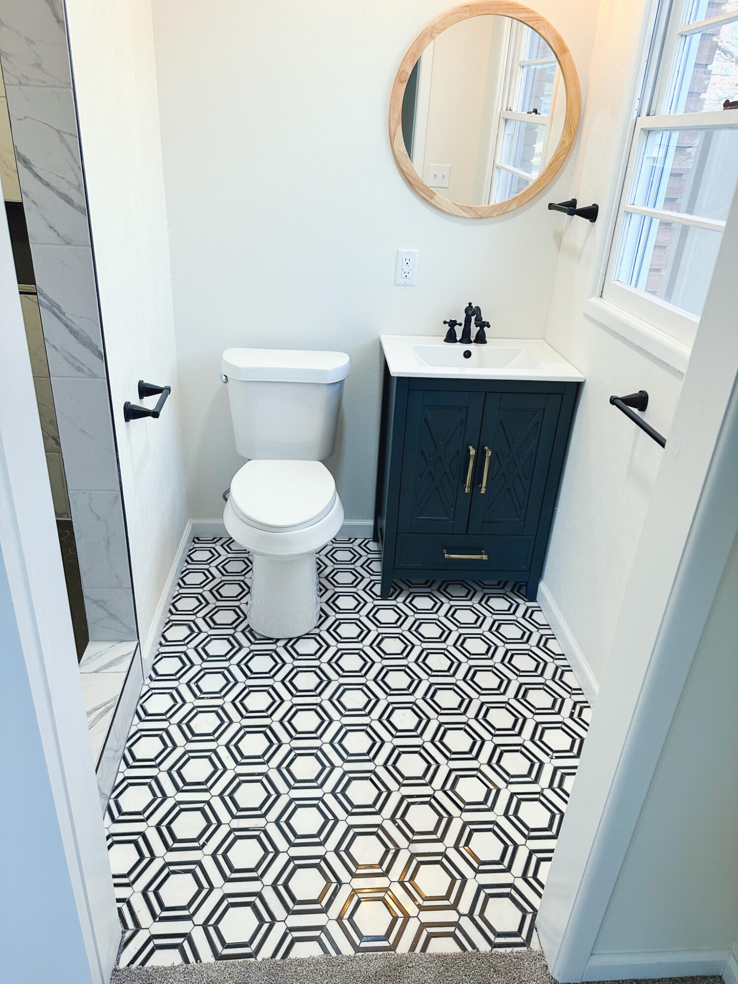 102 Northeast 25th Street Lamesa, TX 79331 - Photo 11 of 32 a bathroom with a toilet and a sink