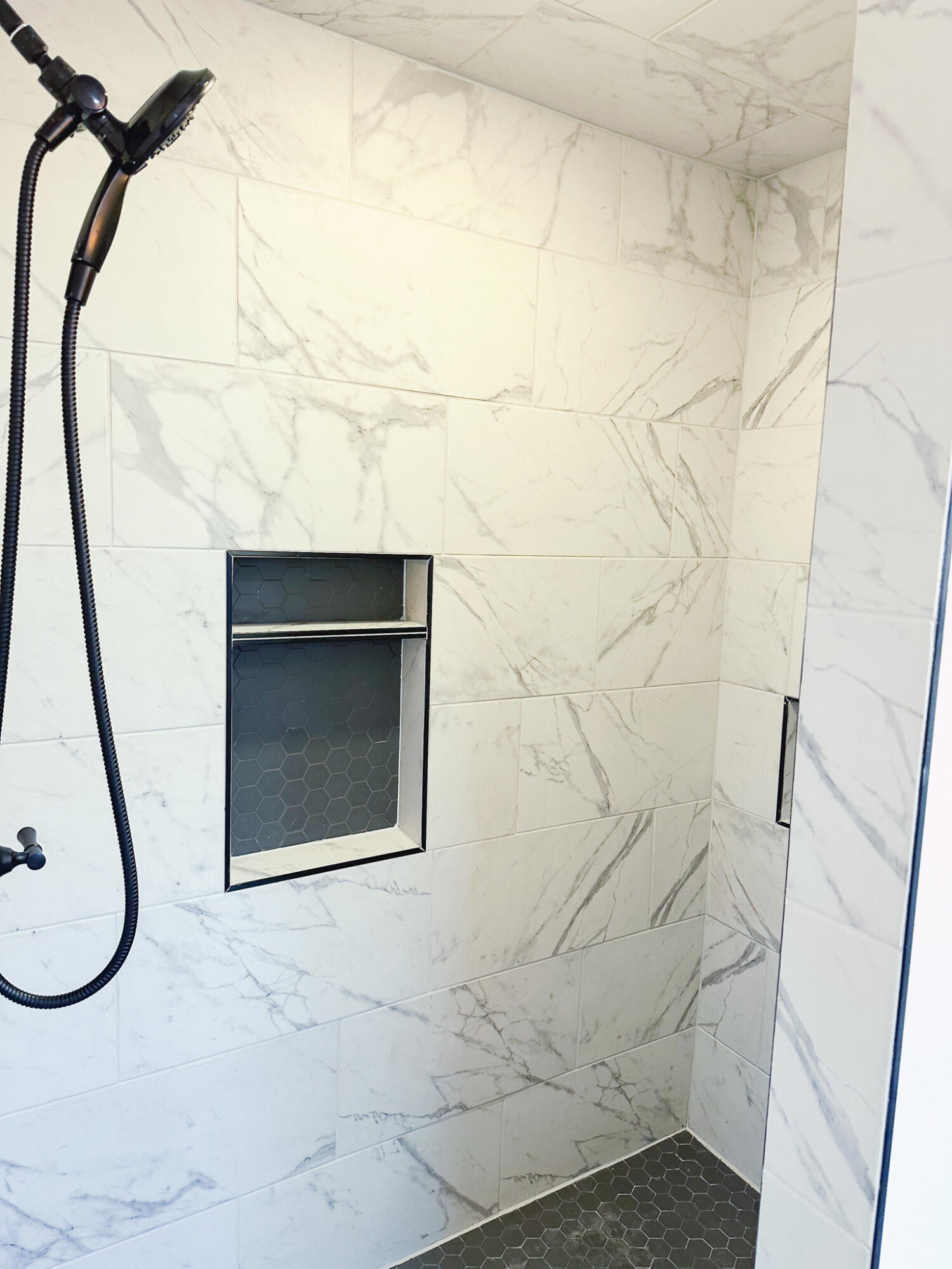 102 Northeast 25th Street Lamesa, TX 79331 - Photo 12 of 32 a bathroom with a granite countertop shower a mirror and toilet