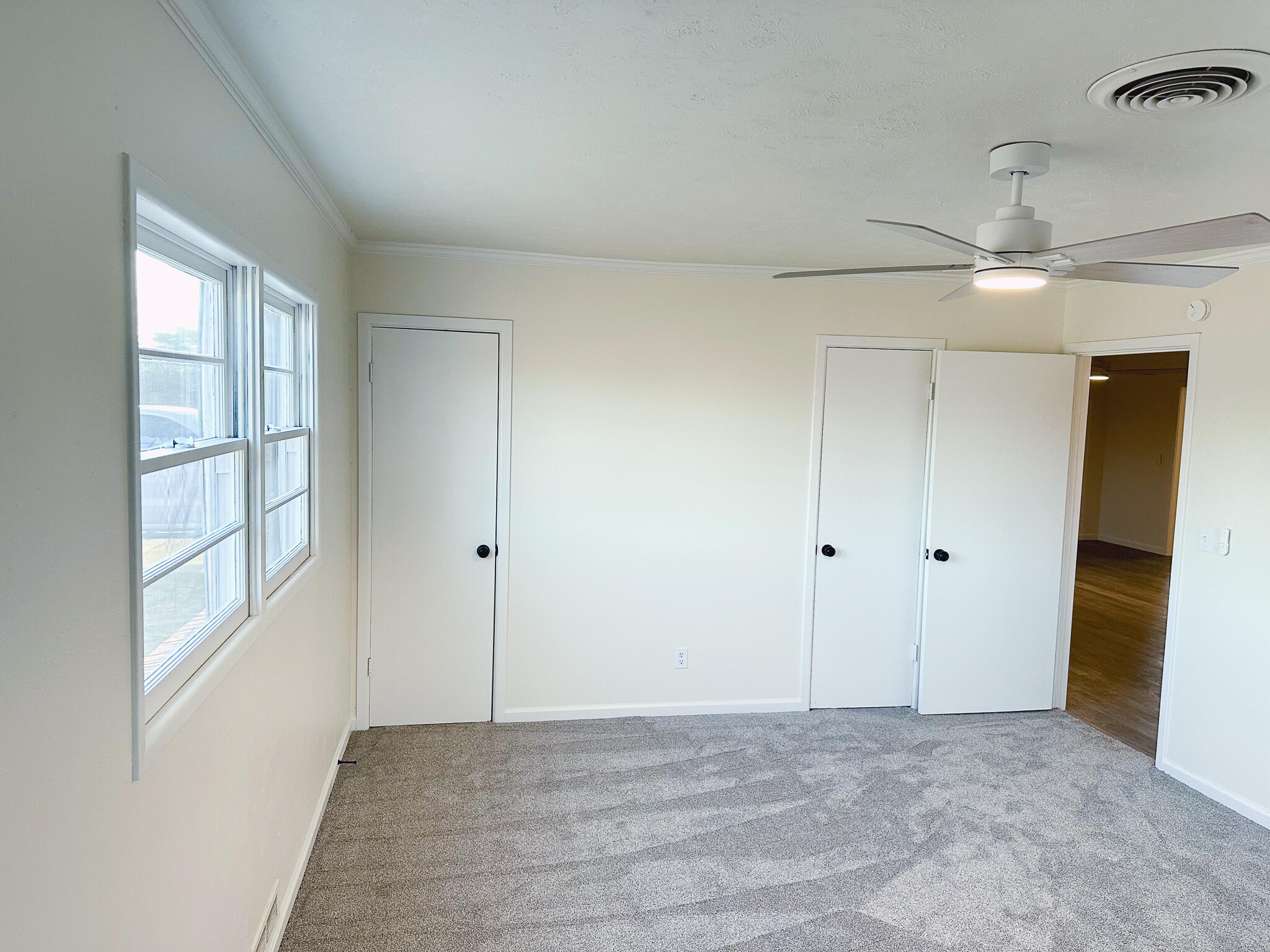 102 Northeast 25th Street Lamesa, TX 79331 - Photo 17 of 32 a view of an empty room with a window