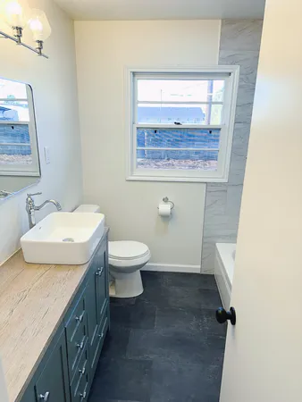 a close up of a bathtub in a bathroom
