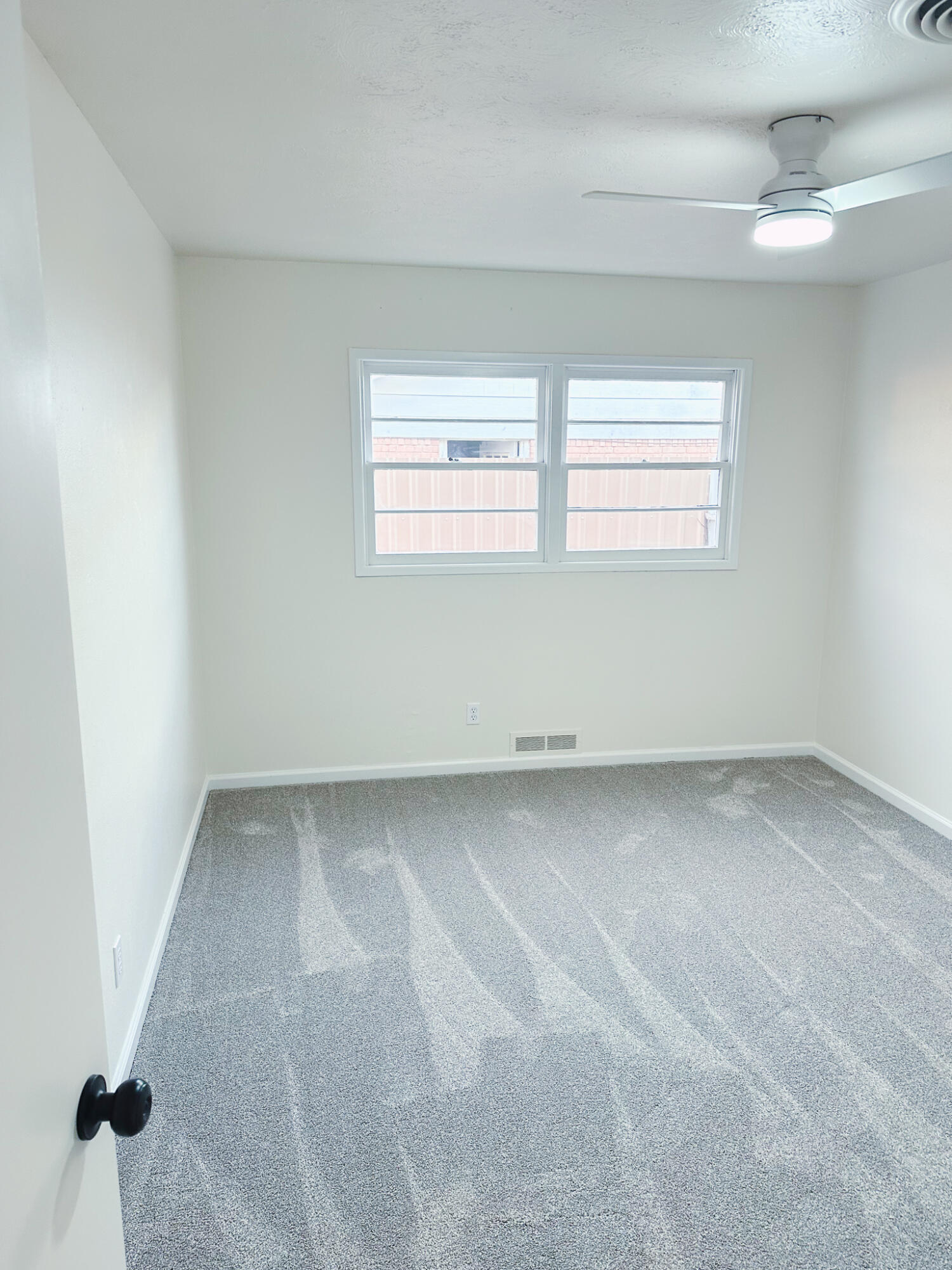 102 Northeast 25th Street Lamesa, TX 79331 - Photo 28 of 32 an empty room with a window