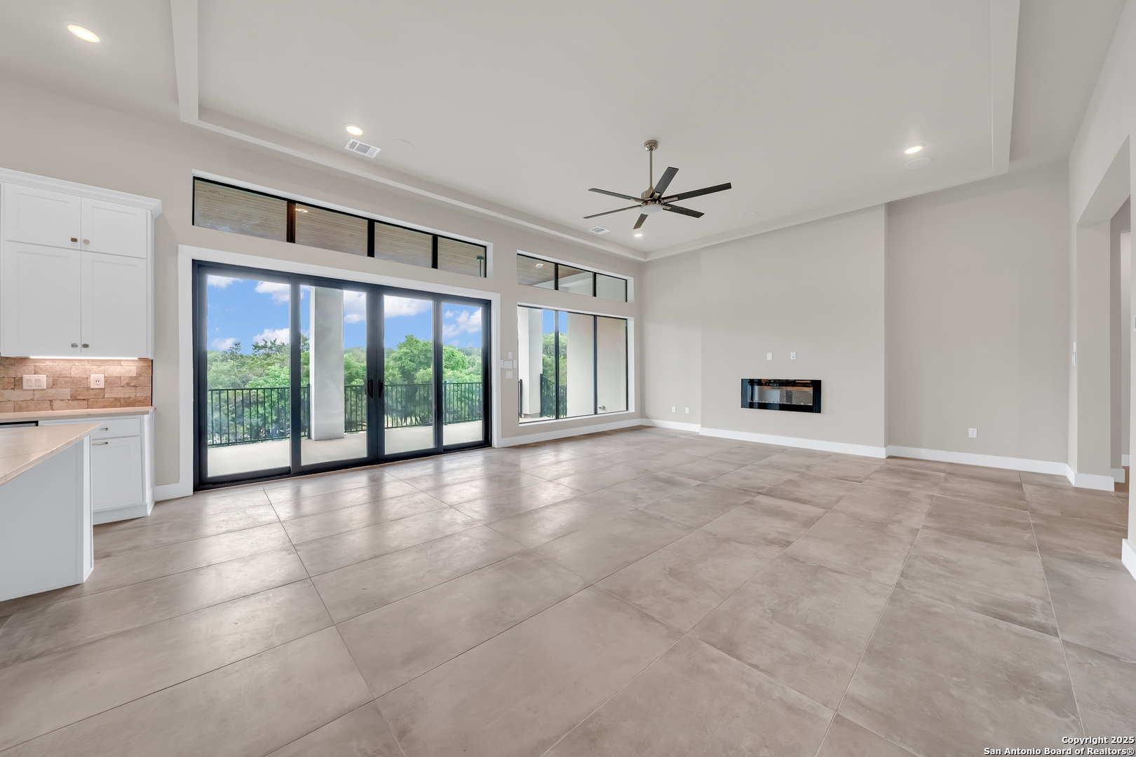 6846 Spring Branch Road Spring Branch, TX 78070 - Photo 23 of 46 a view of a livingroom with a ceiling fan and window