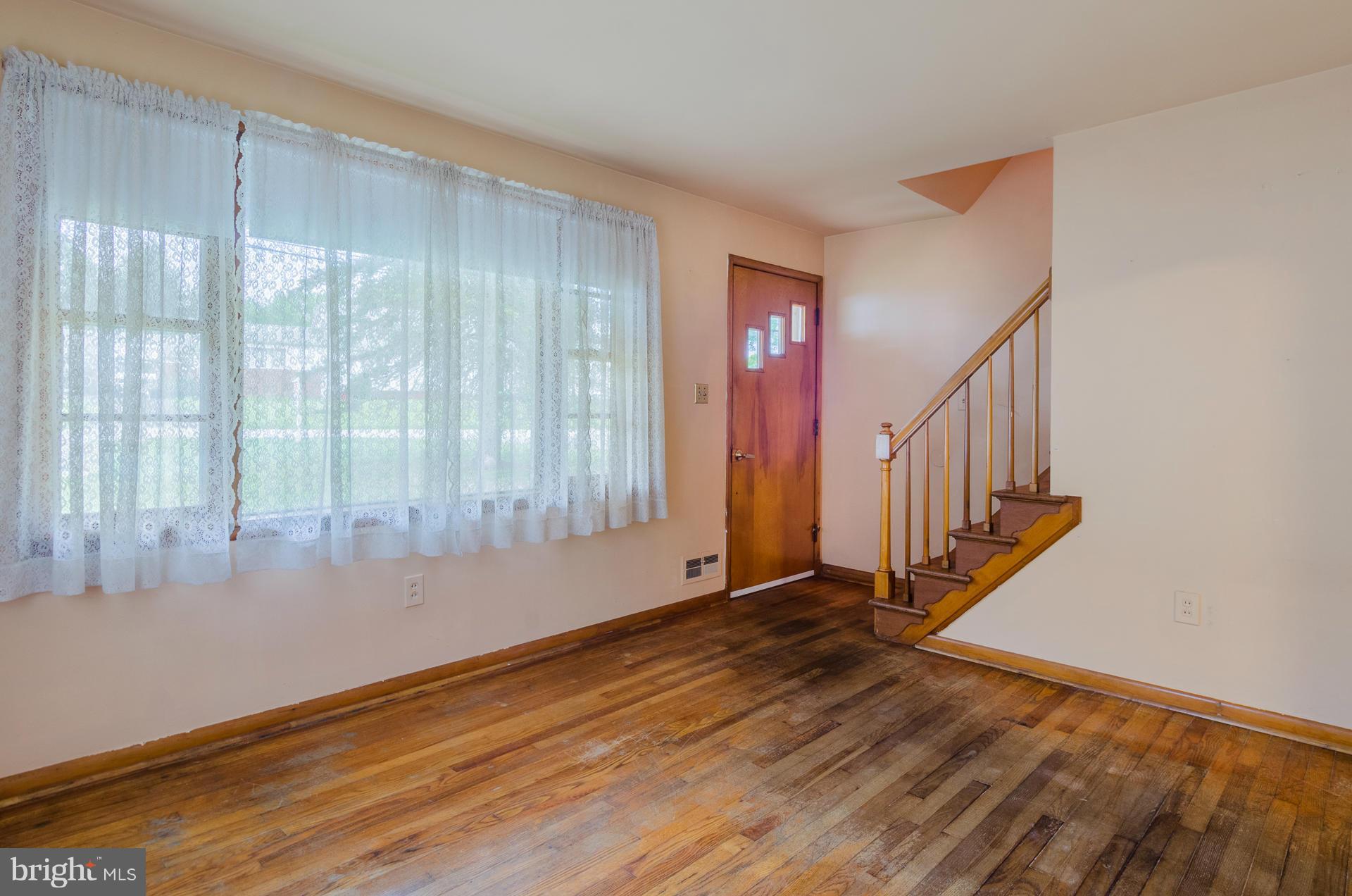 803 Bengies Road Baltimore, MD 21220 - Photo 3 of 30 a view of an entryway with wooden floor