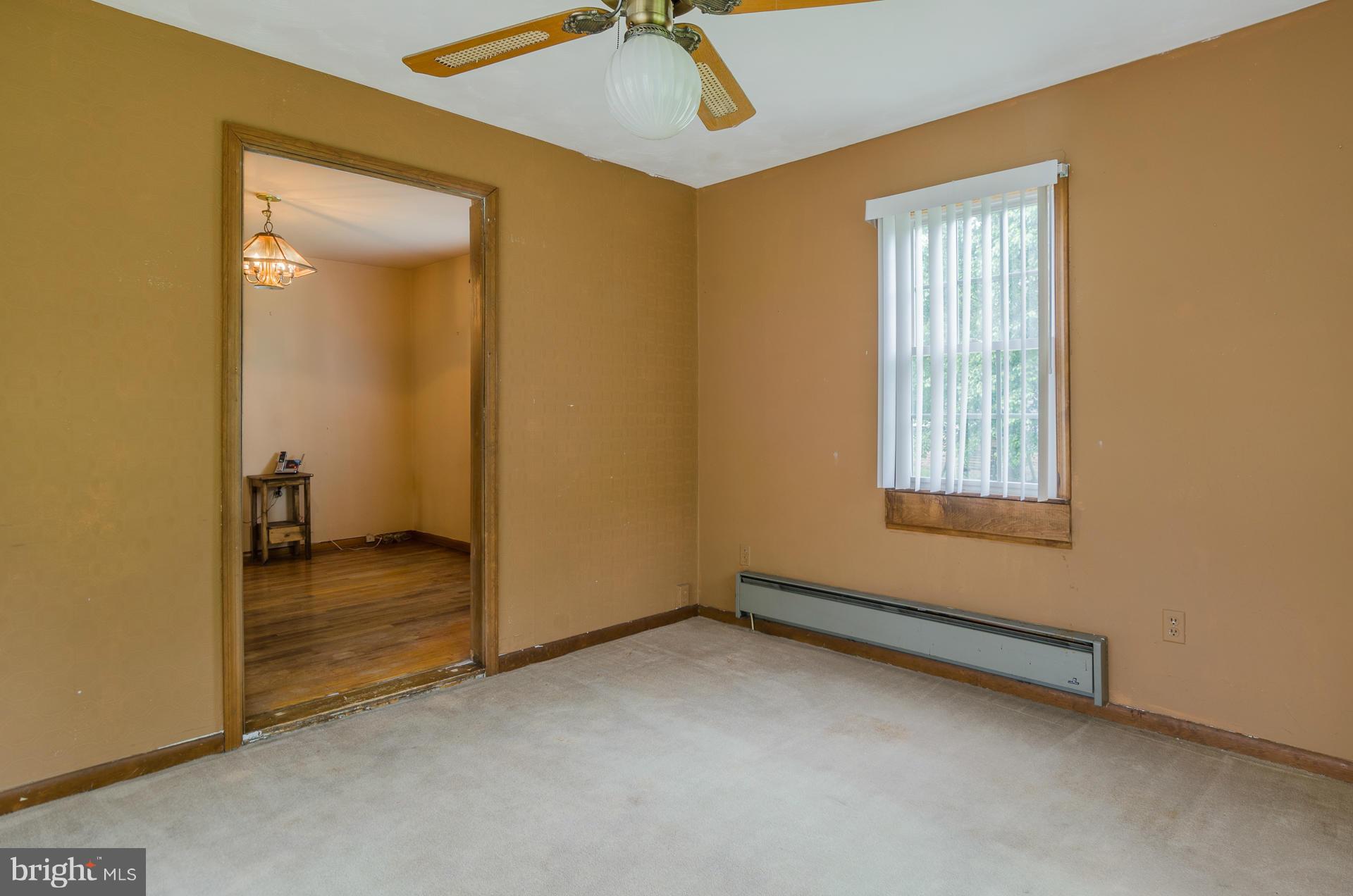 803 Bengies Road Baltimore, MD 21220 - Photo 8 of 30 an empty room with a window