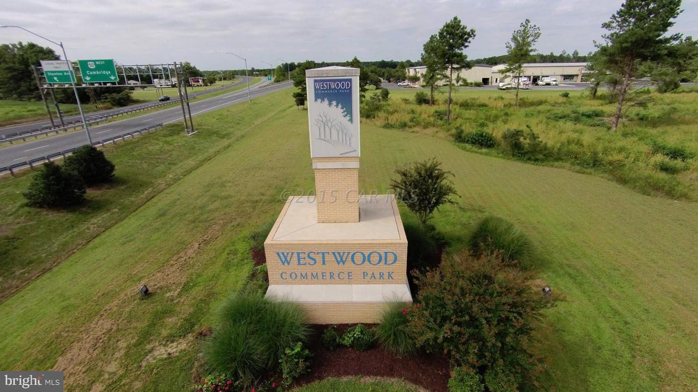 1707 West Road Salisbury, MD 21801 - Photo 3 of 4 a sign that is on the side of a building