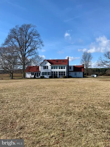 a view of house with outdoor space