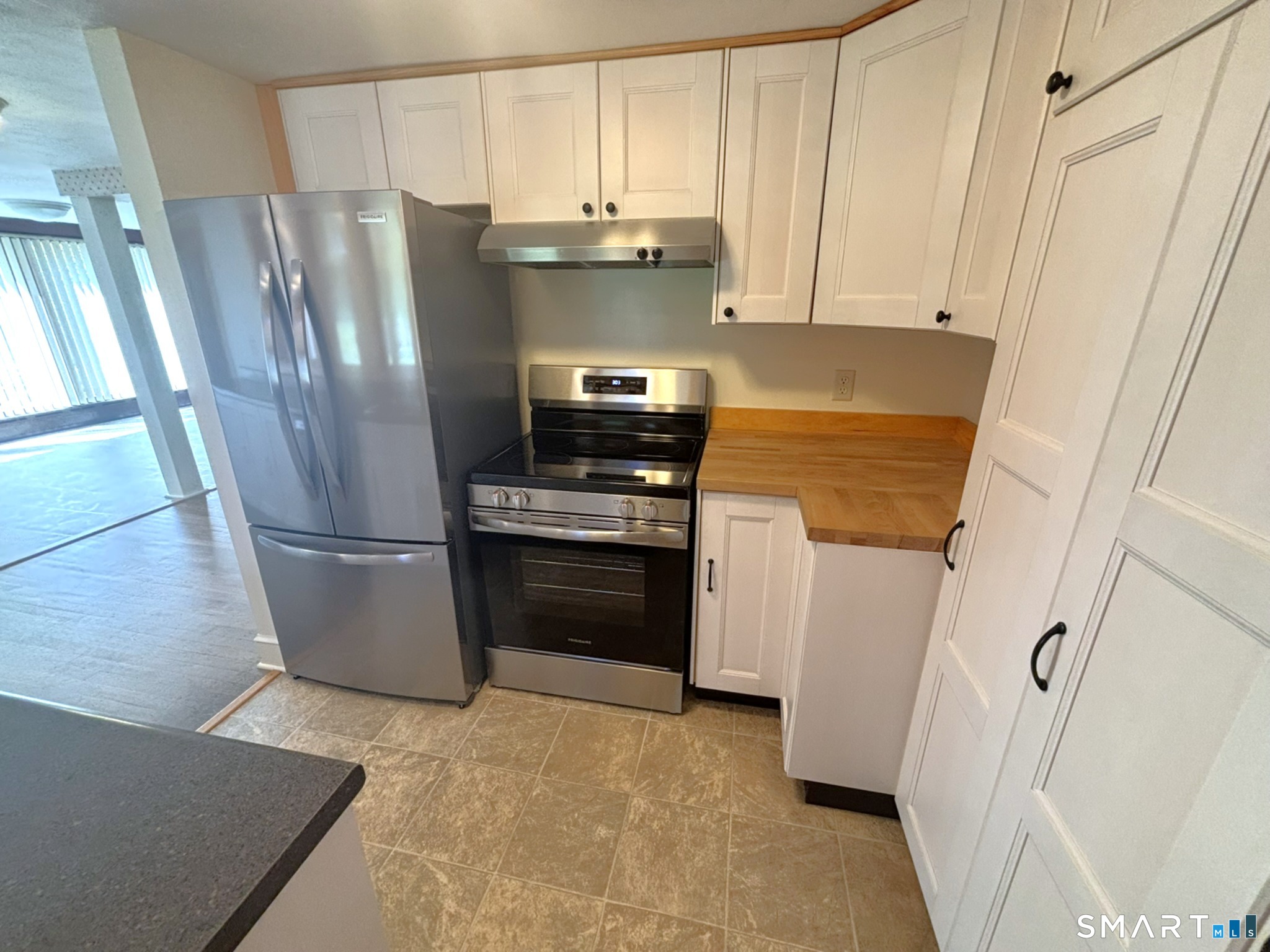 44 Summit Road Prospect, CT 06712 - Photo 11 of 40 a kitchen with stainless steel appliances a refrigerator and a stove