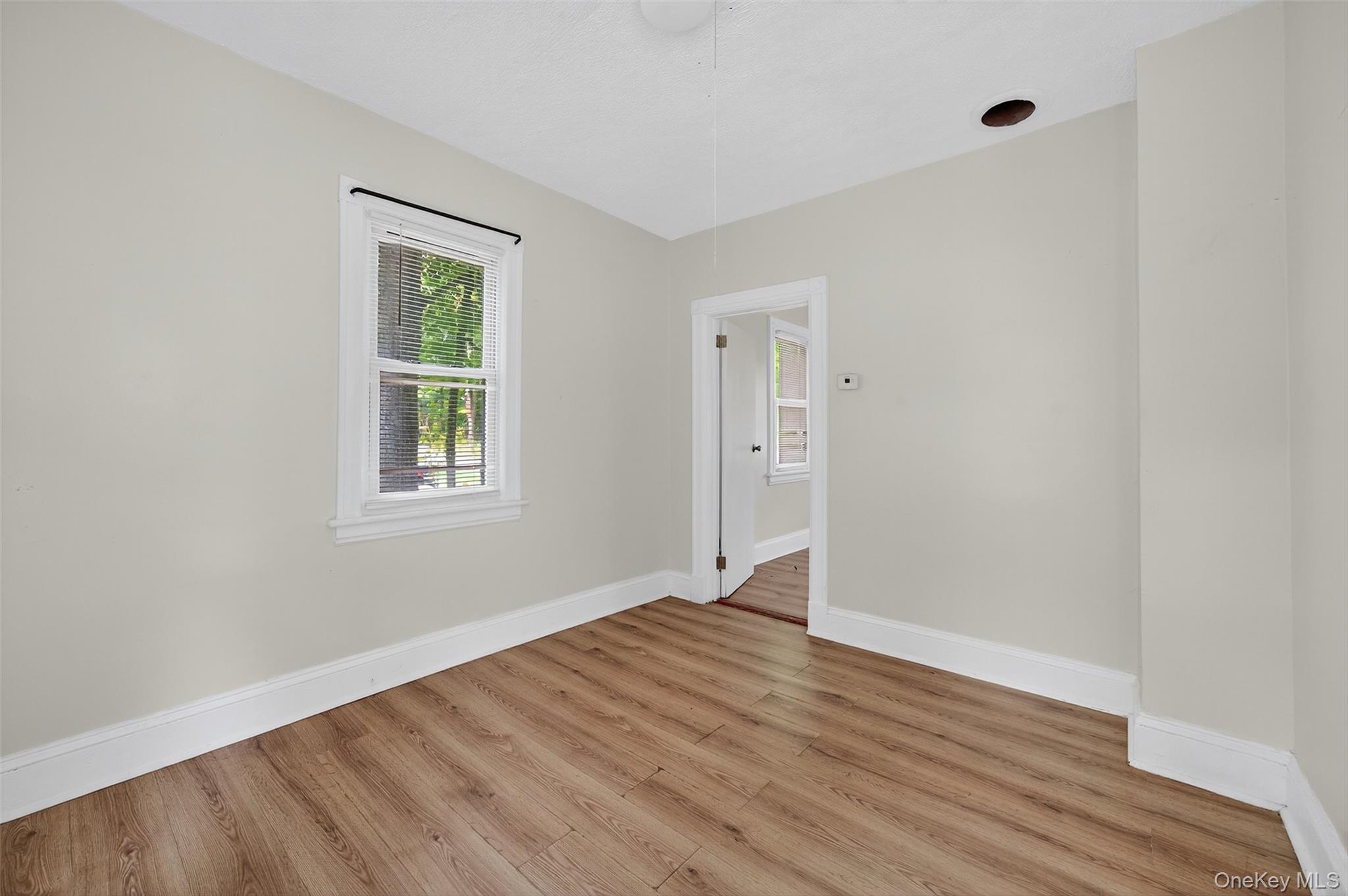 72 Smith Clove Road Central Valley, NY 10917 - Photo 13 of 35 Unfurnished room featuring wood finished floors and baseboards