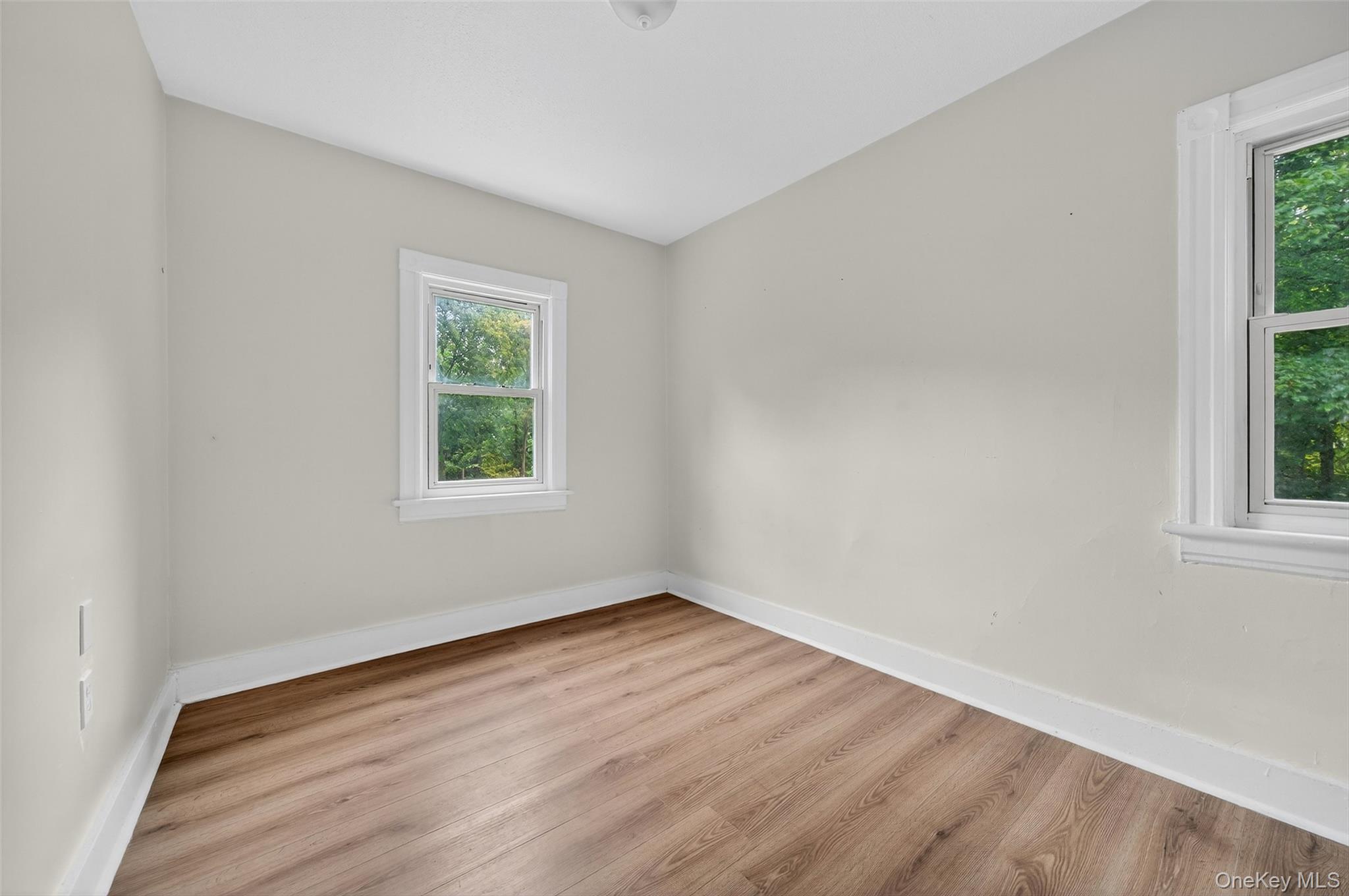 72 Smith Clove Road Central Valley, NY 10917 - Photo 19 of 35 Spare room featuring wood finished floors and baseboards
