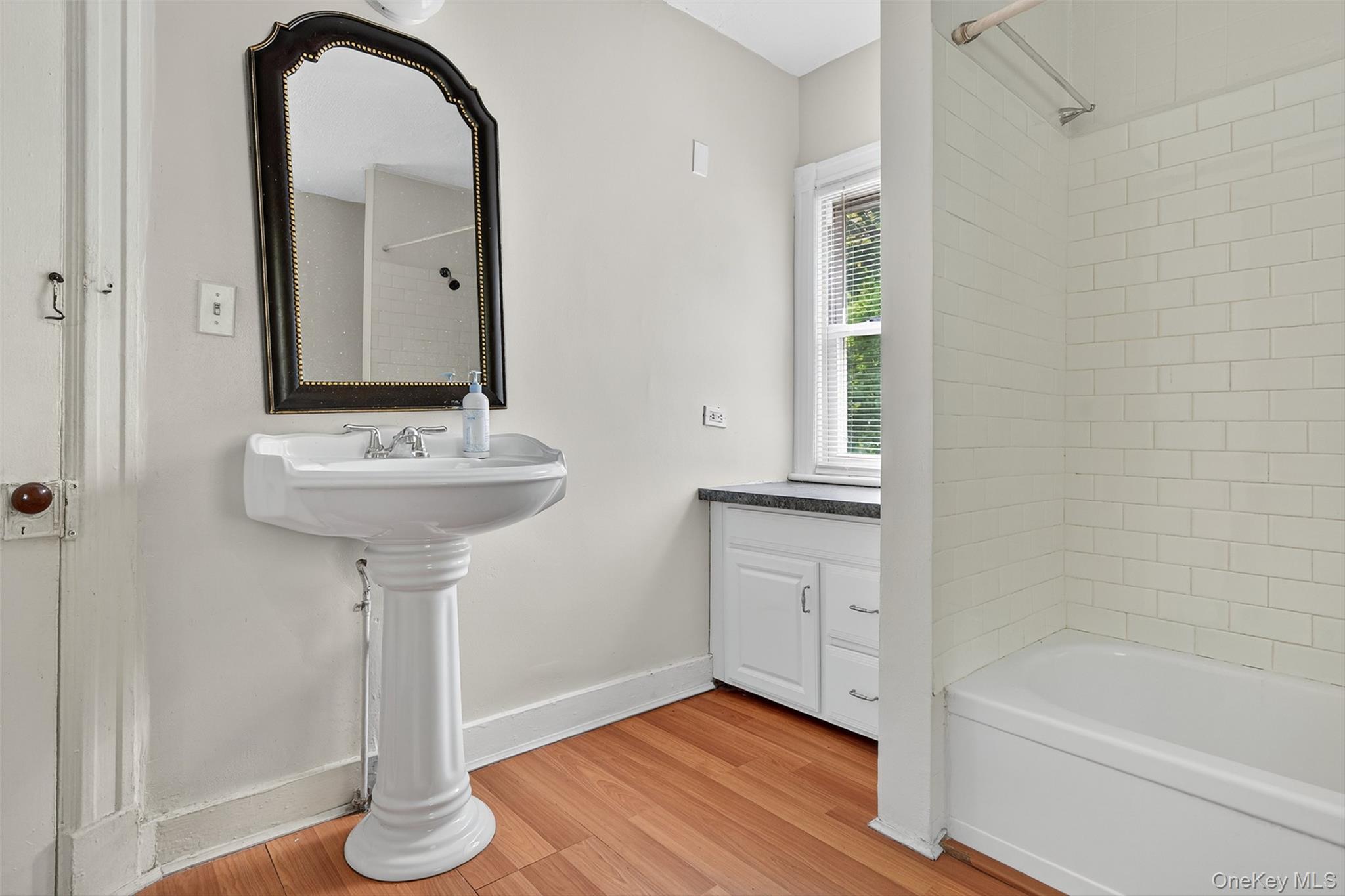 72 Smith Clove Road Central Valley, NY 10917 - Photo 22 of 35 Bathroom featuring shower / tub combination and light wood finished floors