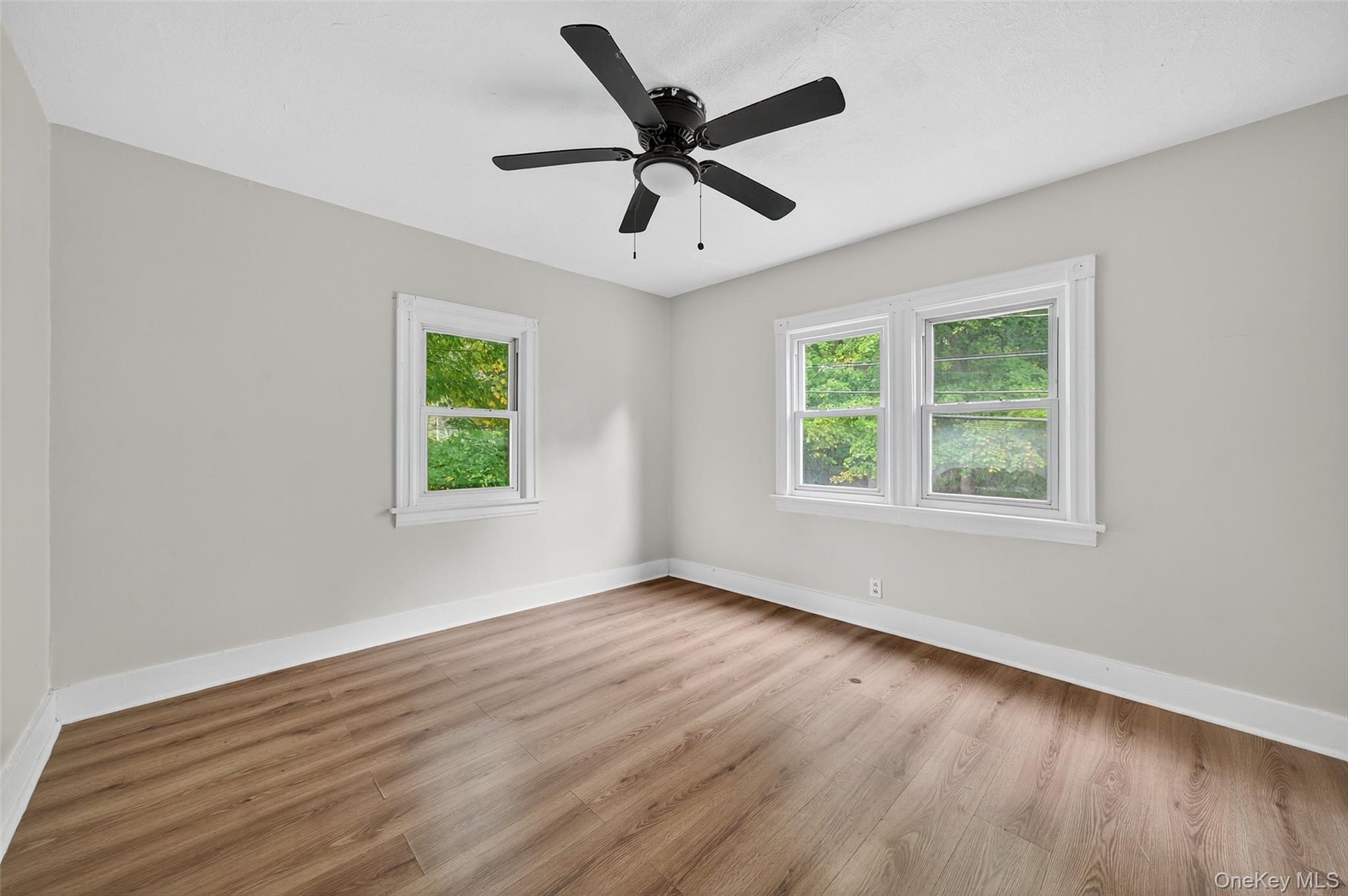 72 Smith Clove Road Central Valley, NY 10917 - Photo 23 of 35 Empty room featuring light wood-style flooring and a ceiling fan