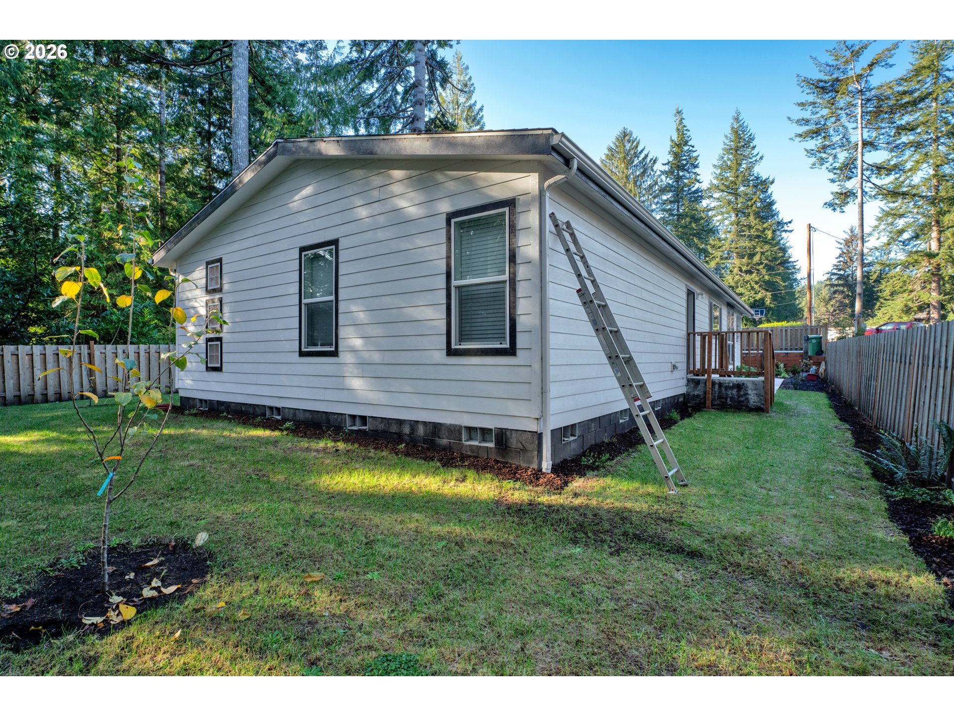 89555 Shorecrest Drive Florence, OR 97439 - Photo 16 of 24 a view of a house with a yard
