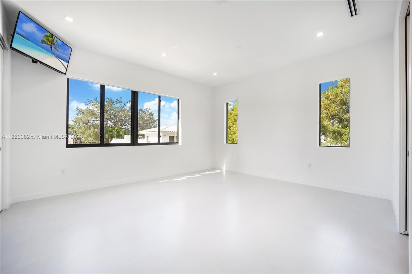 442 Southwest 15th Road Miami, FL 33129 - Photo 11 of 18 an empty room with a window