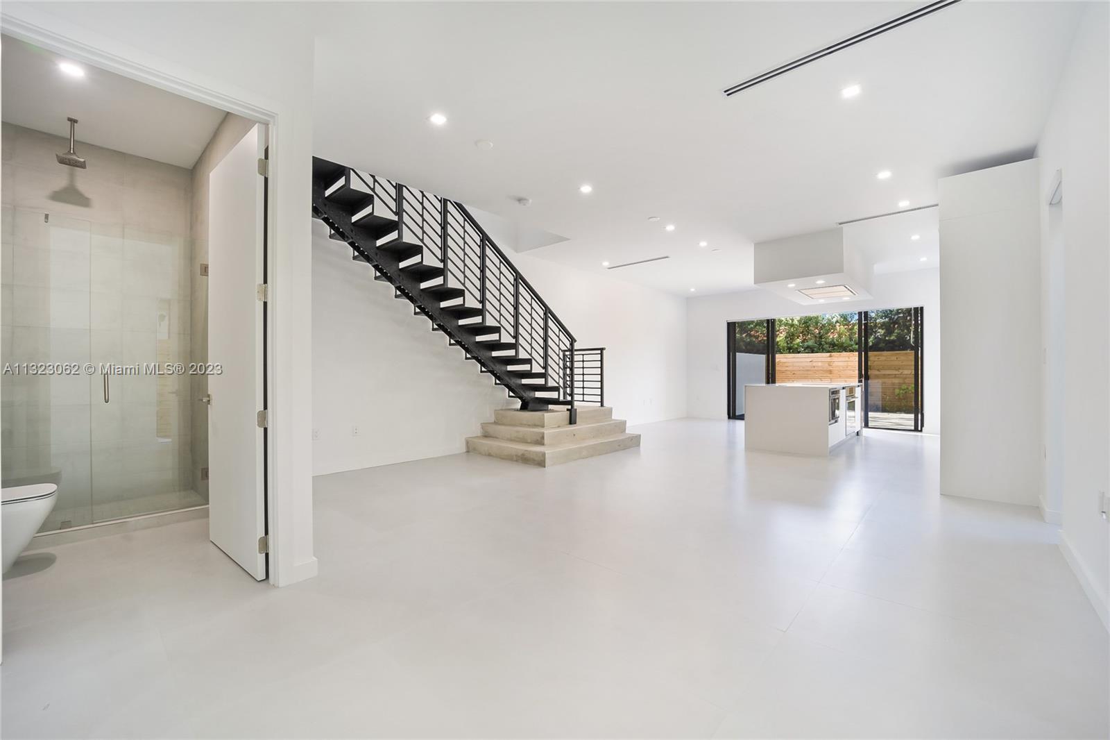 442 Southwest 15th Road Miami, FL 33129 - Photo 5 of 18 wooden floor and an entryway in a room