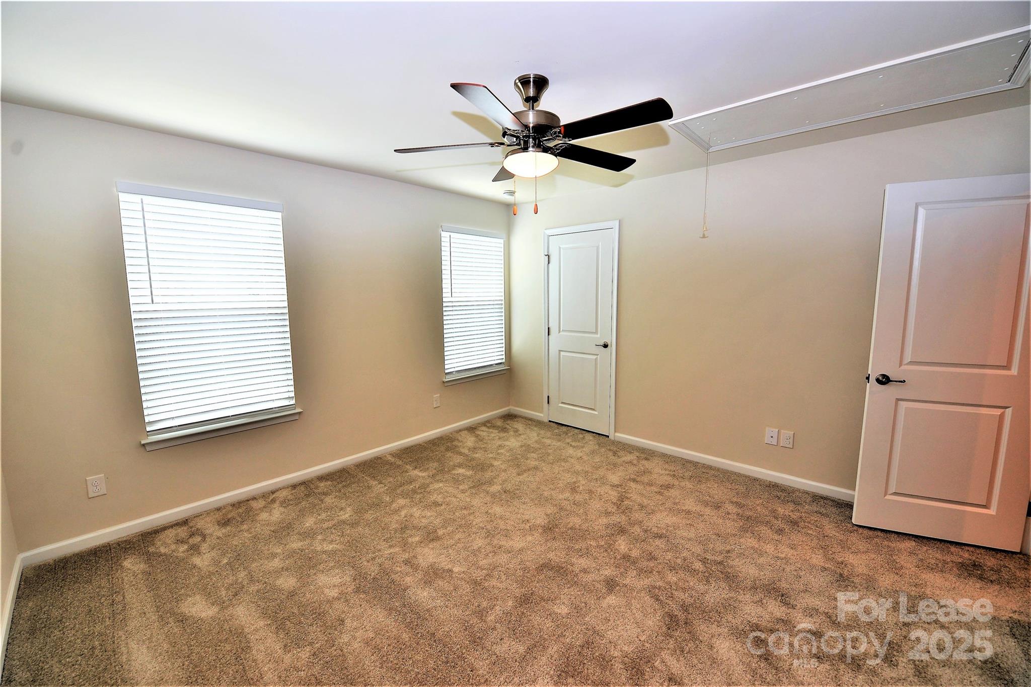 2829 Sand Cove Court Denver, NC 28037 - Photo 20 of 31 a view of a livingroom with a ceiling fan and window