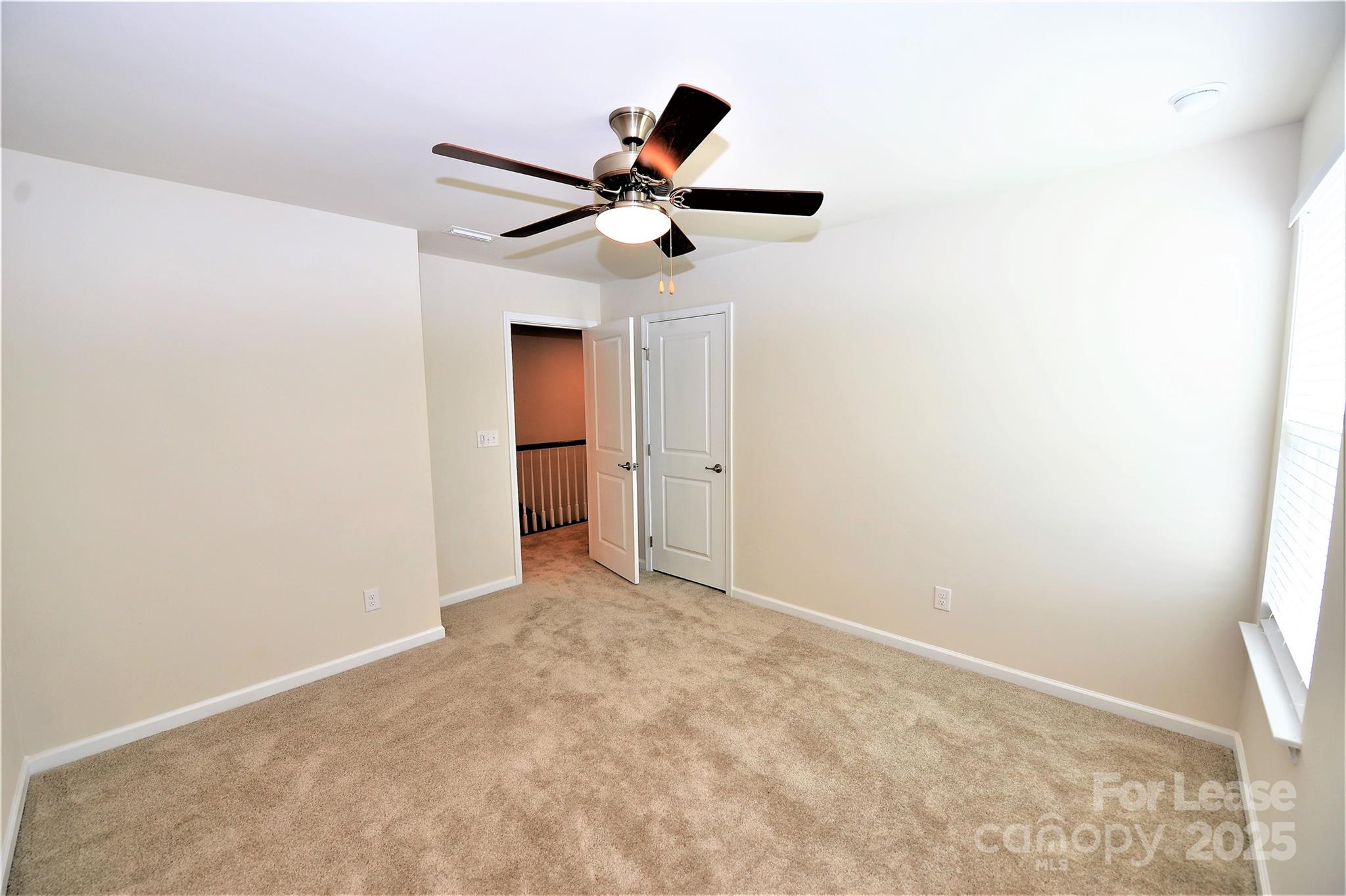 2829 Sand Cove Court Denver, NC 28037 - Photo 23 of 31 a view of empty room with window