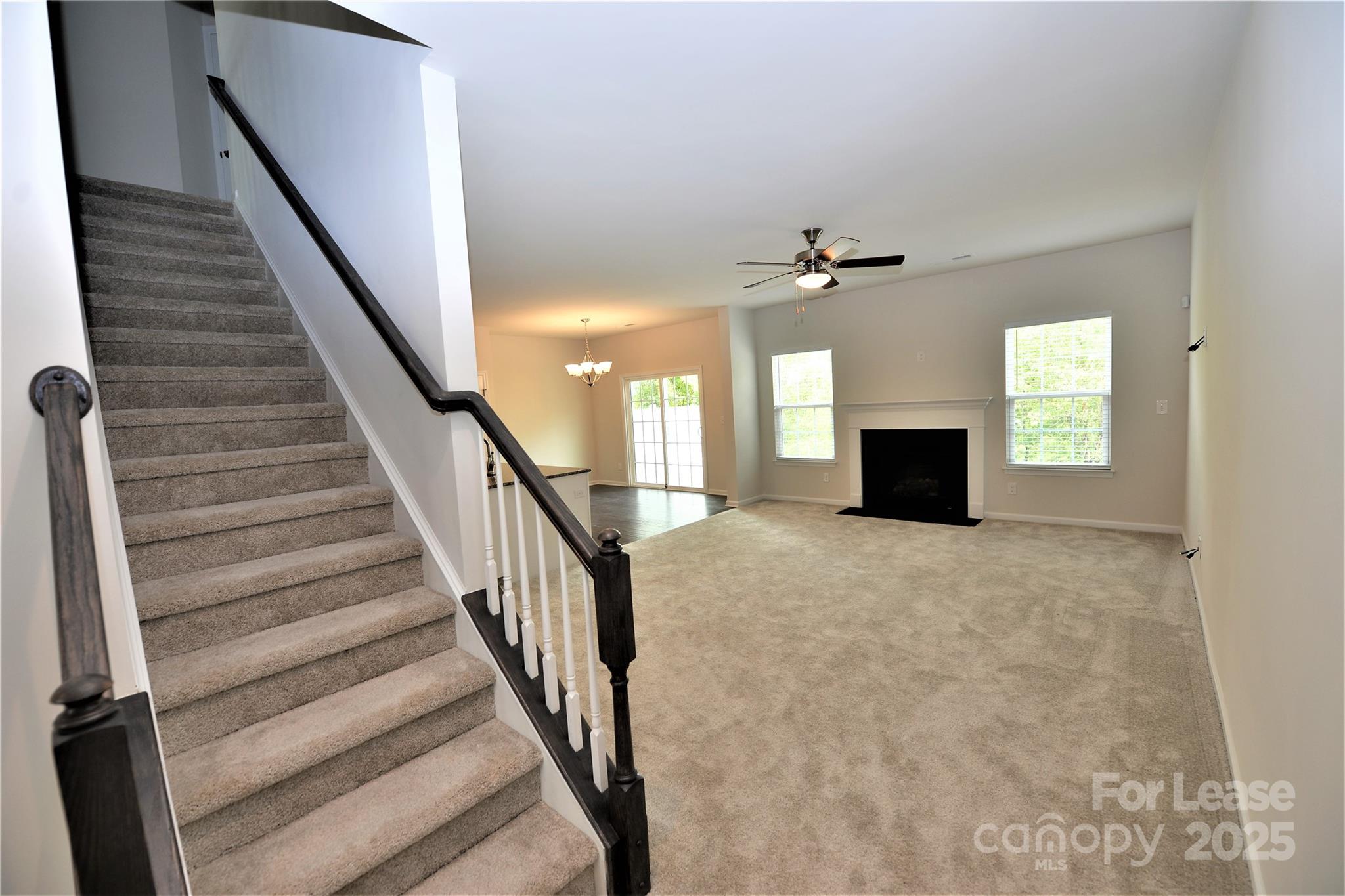 2829 Sand Cove Court Denver, NC 28037 - Photo 6 of 31 a view of an entryway with wooden floor and a livingroom view