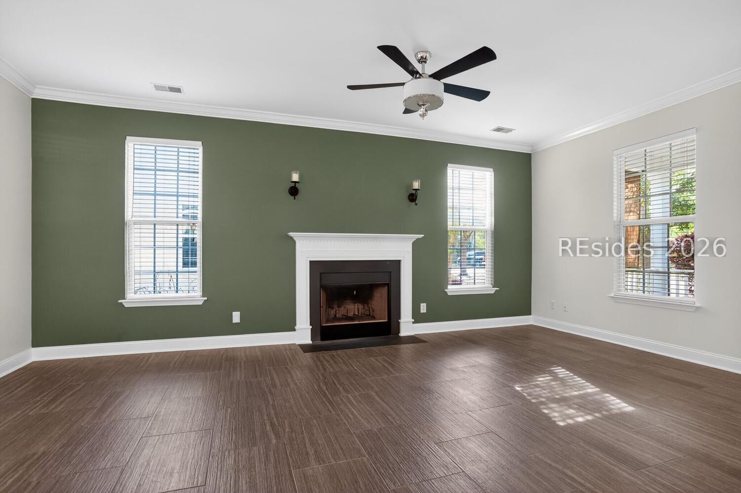 100 9th Avenue Bluffton, SC 29910 - Photo 5 of 45 Wood-burning fireplace with mantle