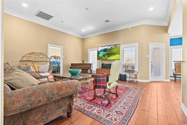 a living room with furniture and a rug