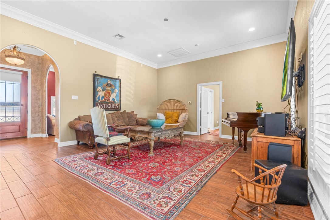 8 Republic Drive Waco, TX 76708 - Photo 19 of 42 a living room with furniture a rug and a large window