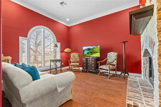 a view of a livingroom with workspace and a couch