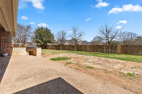 a view of a outdoor space with swimming pool
