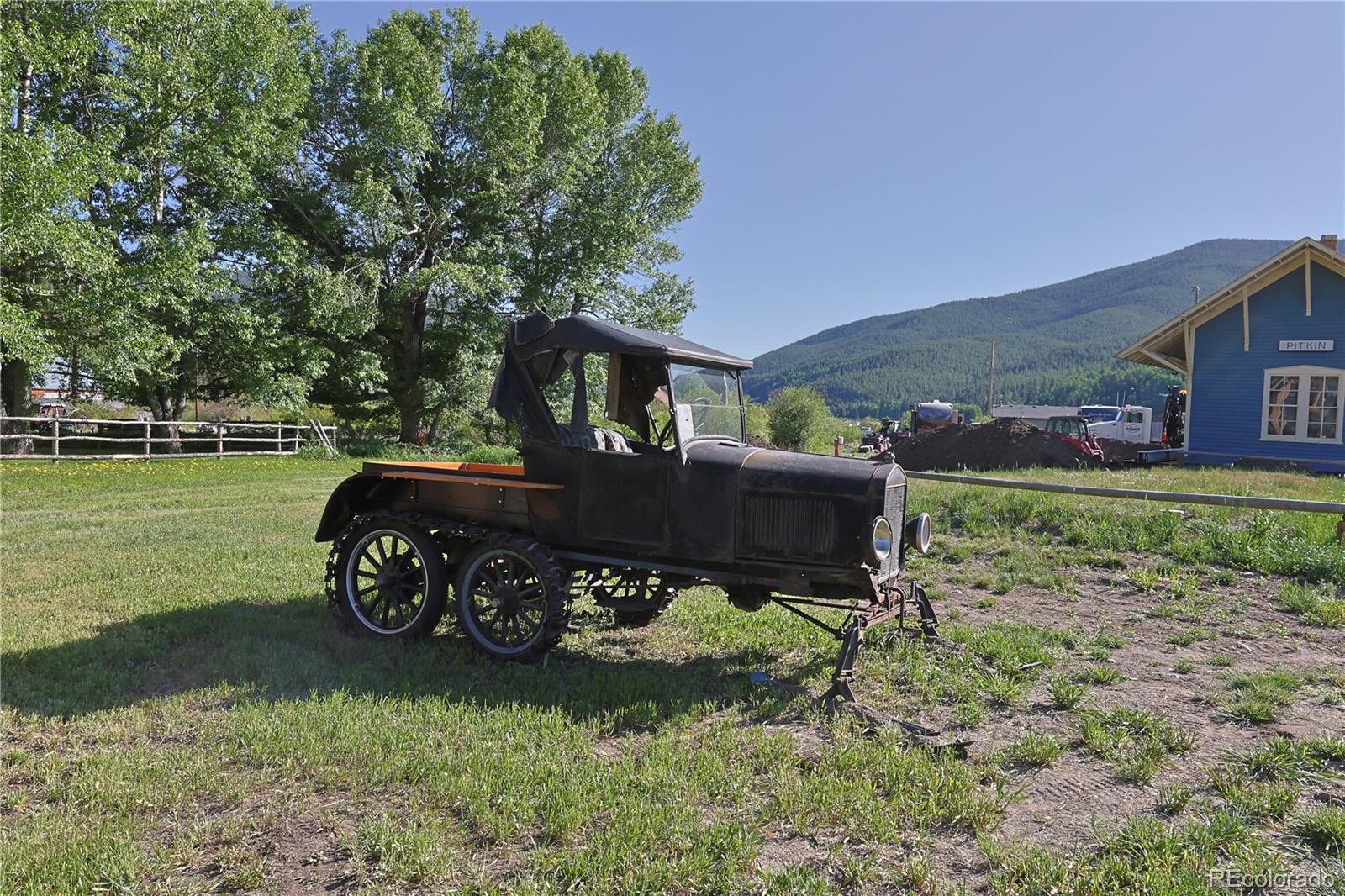 101 3rd Street Pitkin, CO 81241 - Photo 26 of 26 a view of a backyard with a garden and plants