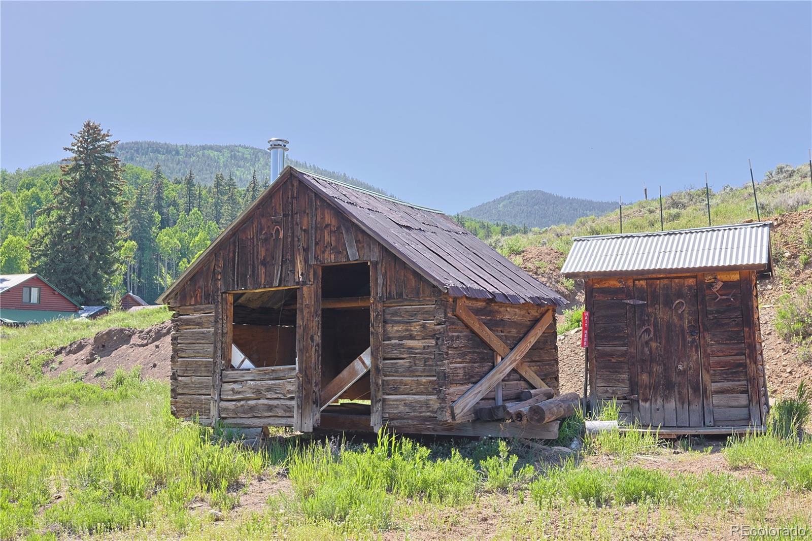 101 3rd Street Pitkin, CO 81241 - Photo 3 of 26 a view of a house with backyard and a garden