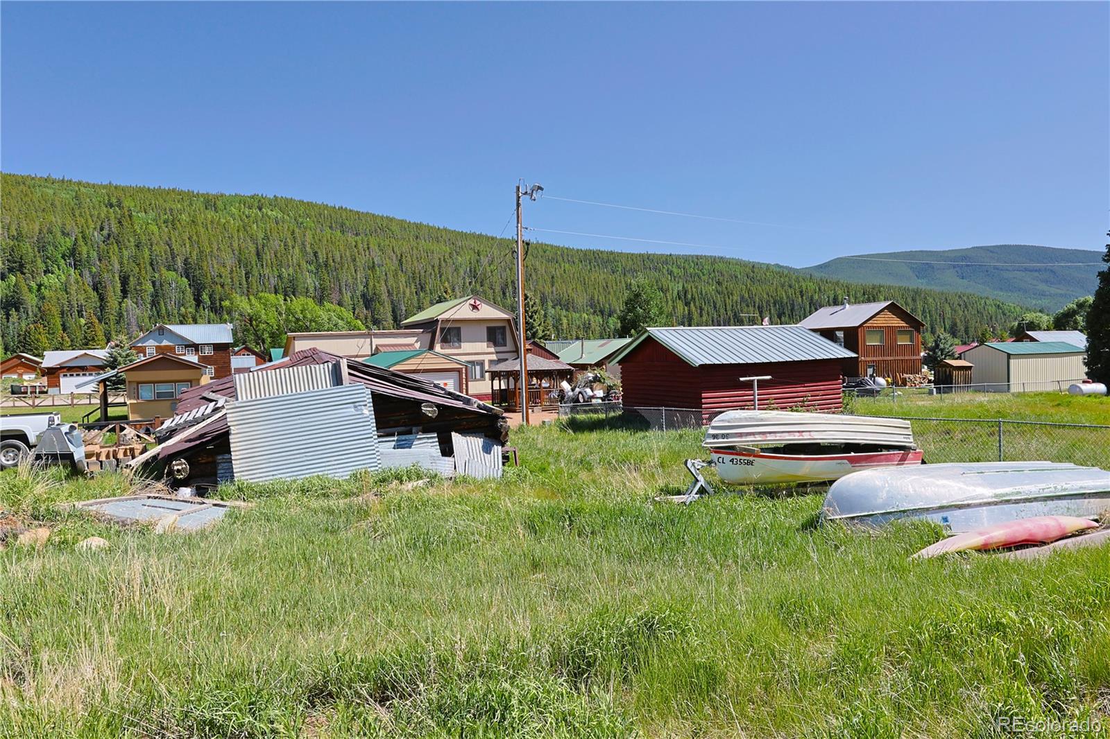 101 3rd Street Pitkin, CO 81241 - Photo 6 of 26 a backyard of a house with table and chairs