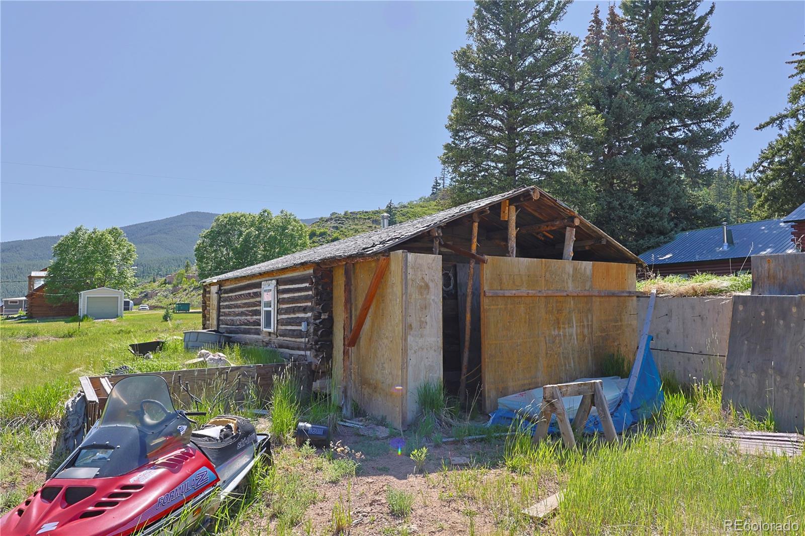101 3rd Street Pitkin, CO 81241 - Photo 10 of 26 a backyard of a house with lots of green space