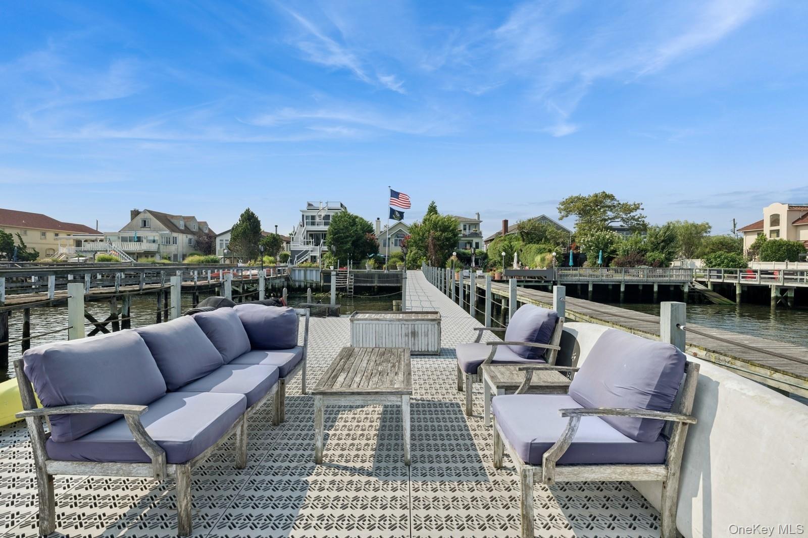 101 Bay Street Long Beach, NY 11561 - Photo 31 of 42 a view of roof deck with couches and city view