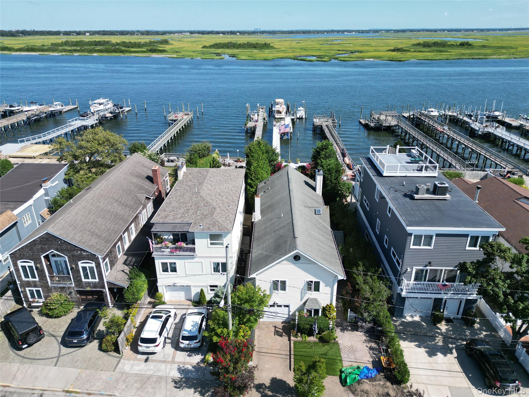 101 Bay Street Long Beach, NY 11561 - Photo 35 of 42 an aerial view of multiple houses with yard