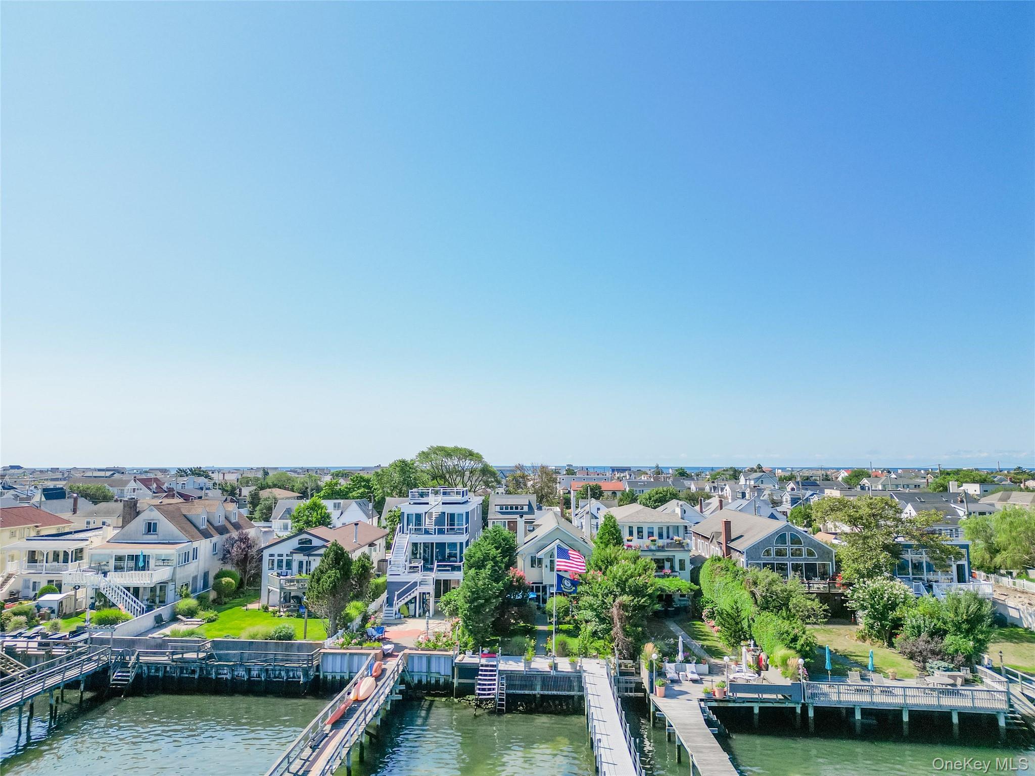 101 Bay Street Long Beach, NY 11561 - Photo 39 of 42 an aerial view of a houses with outdoor space