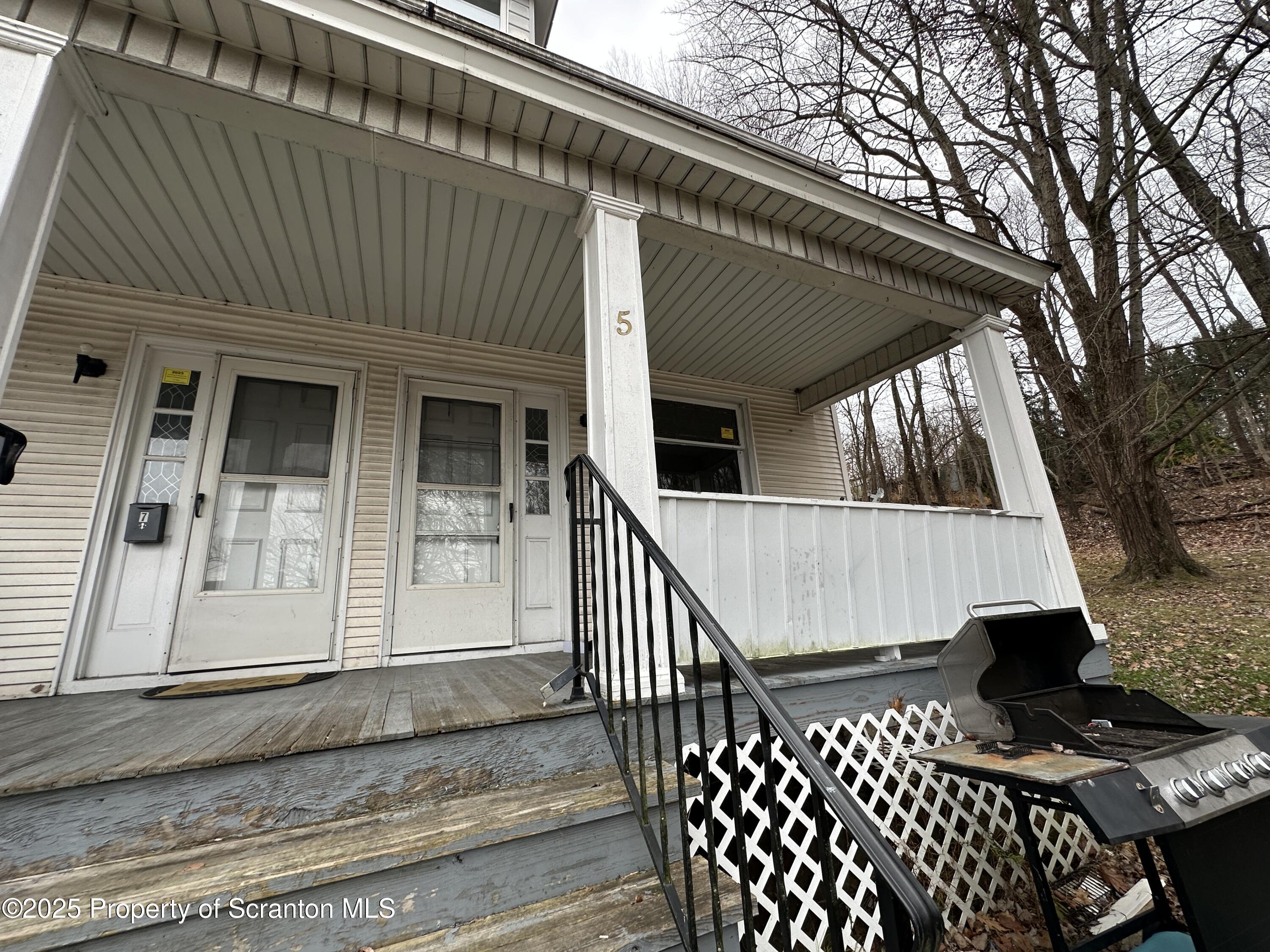 5 Robert Street Nanticoke, PA 18634 - Photo 25 of 26 a view of a house with wooden fence