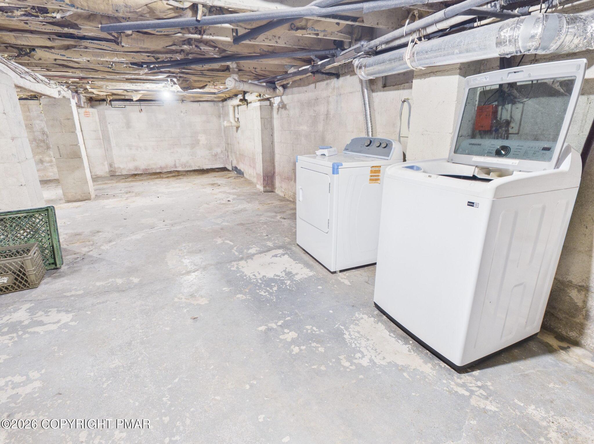 1208 Mattioli Road Bartonsville, PA 18321 - Photo 15 of 23 a view of storage and utility room with washer and dryer