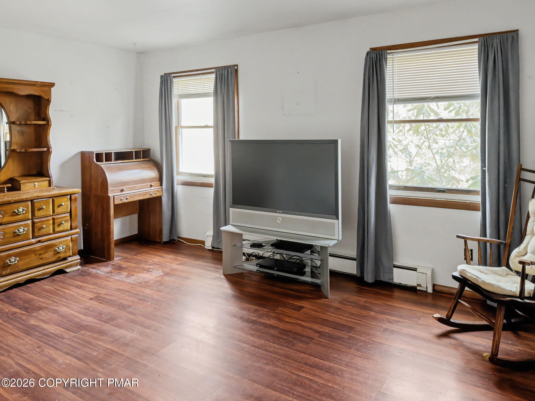 1208 Mattioli Road Bartonsville, PA 18321 - Photo 3 of 23 a living room with furniture and a flat screen tv