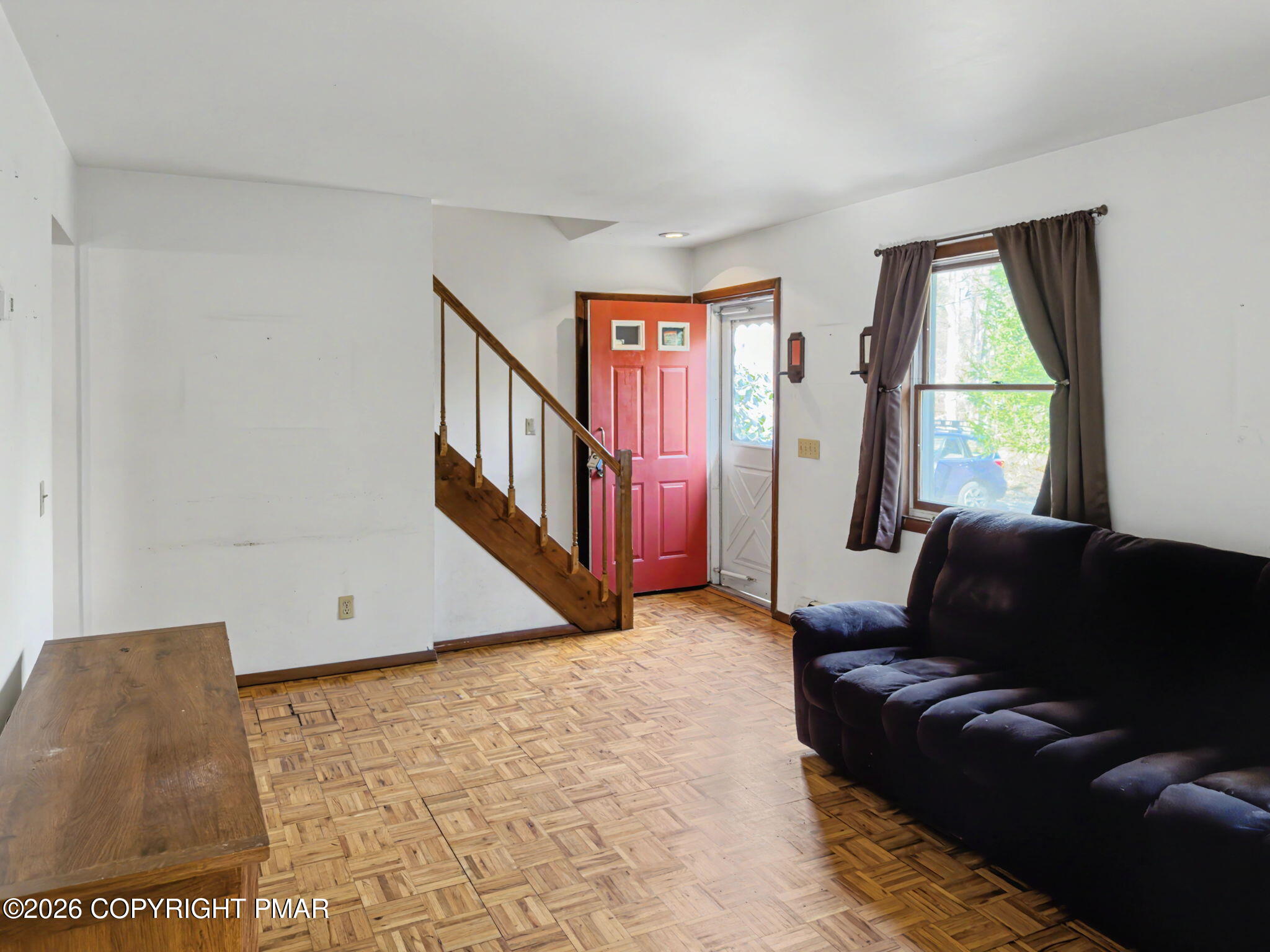 1208 Mattioli Road Bartonsville, PA 18321 - Photo 4 of 23 a living room with furniture and a window