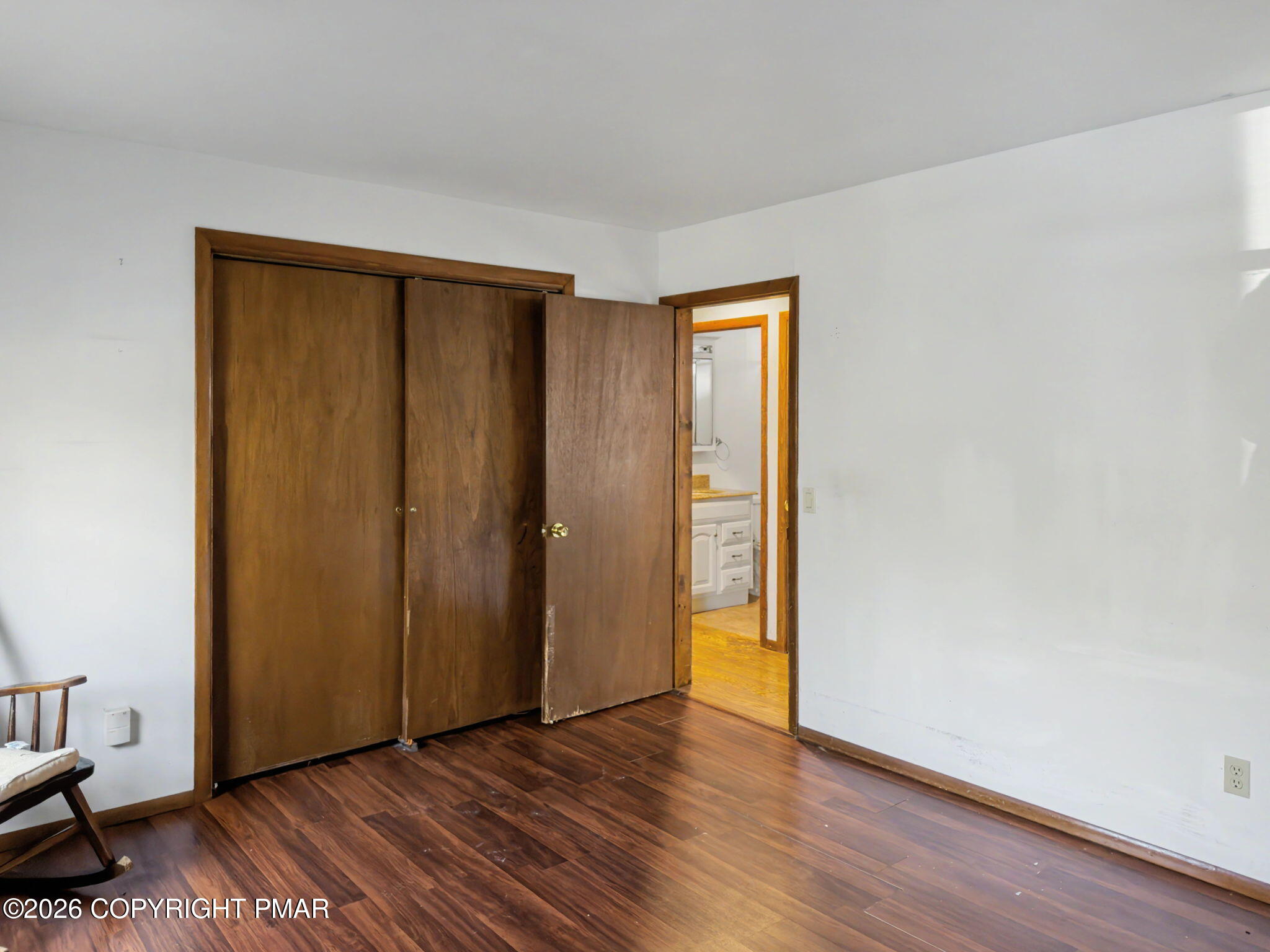 1208 Mattioli Road Bartonsville, PA 18321 - Photo 9 of 23 a view of an empty room with wooden floor and a window