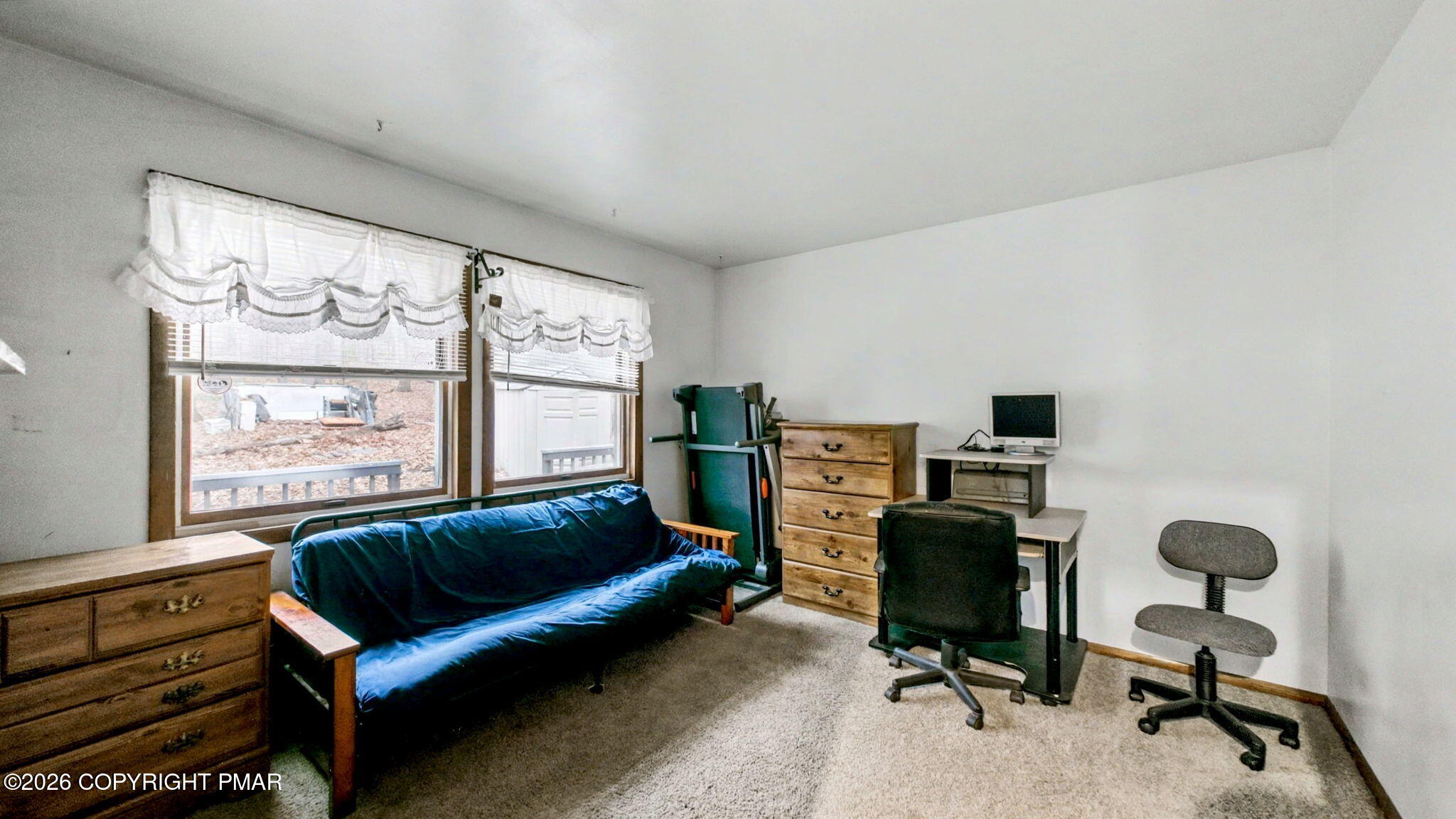 1208 Mattioli Road Bartonsville, PA 18321 - Photo 10 of 23 a living room with furniture and a window