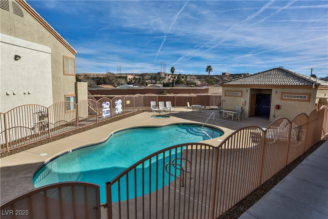 4655 Gold Dust Avenue, Unit 206 Las Vegas, NV 89120 - Photo 27 of 34 Community pool featuring a patio area