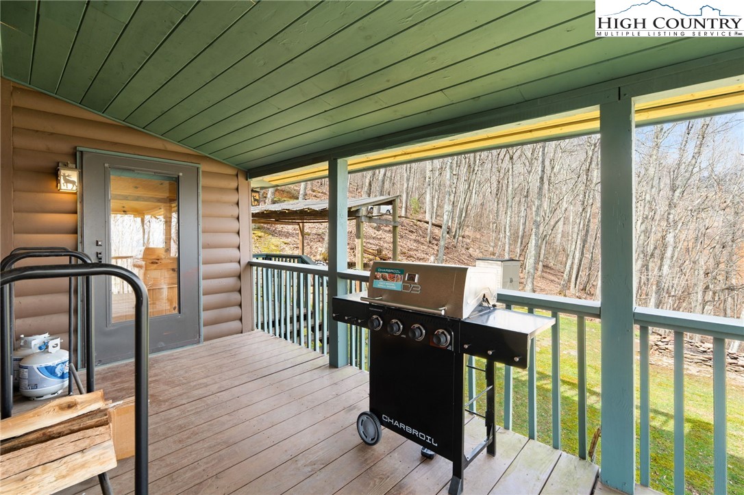 1748 Junaluska Road Boone, NC 28607 - Photo 29 of 37 a view of a balcony with wooden floor