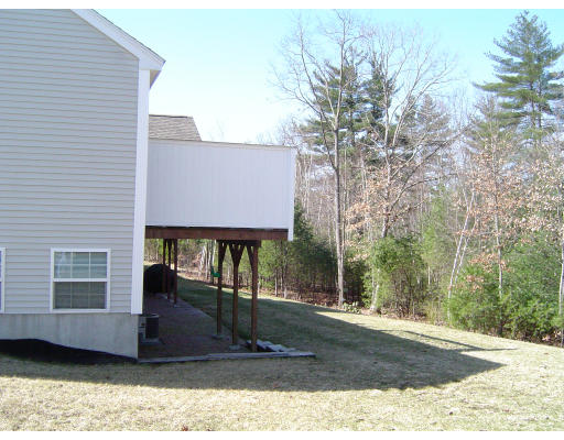 38 Brookview Road, Unit 38 Windham, NH 03087 - Photo 17 of 17 a view of a house with a yard
