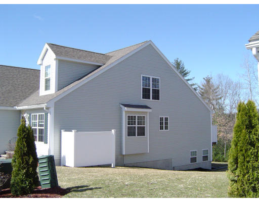 38 Brookview Road, Unit 38 Windham, NH 03087 - Photo 2 of 17 a view of a house with backyard and garden