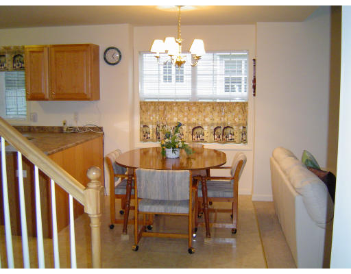 38 Brookview Road, Unit 38 Windham, NH 03087 - Photo 4 of 17 a dining room with furniture and window