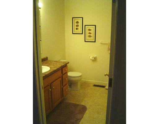 38 Brookview Road, Unit 38 Windham, NH 03087 - Photo 10 of 17 a bathroom with a sink and a toilet